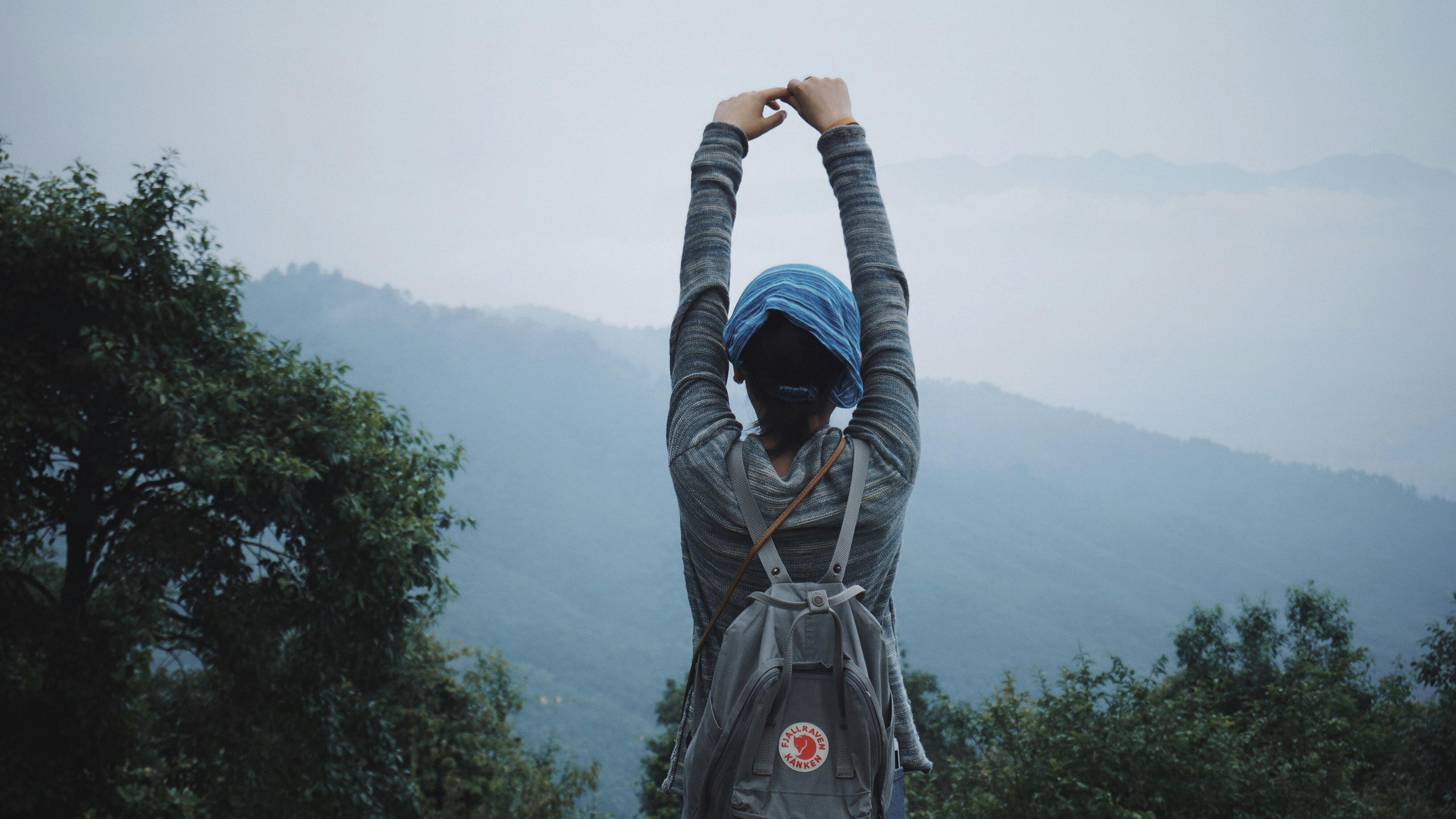 female_trekker_stretching_after_trek