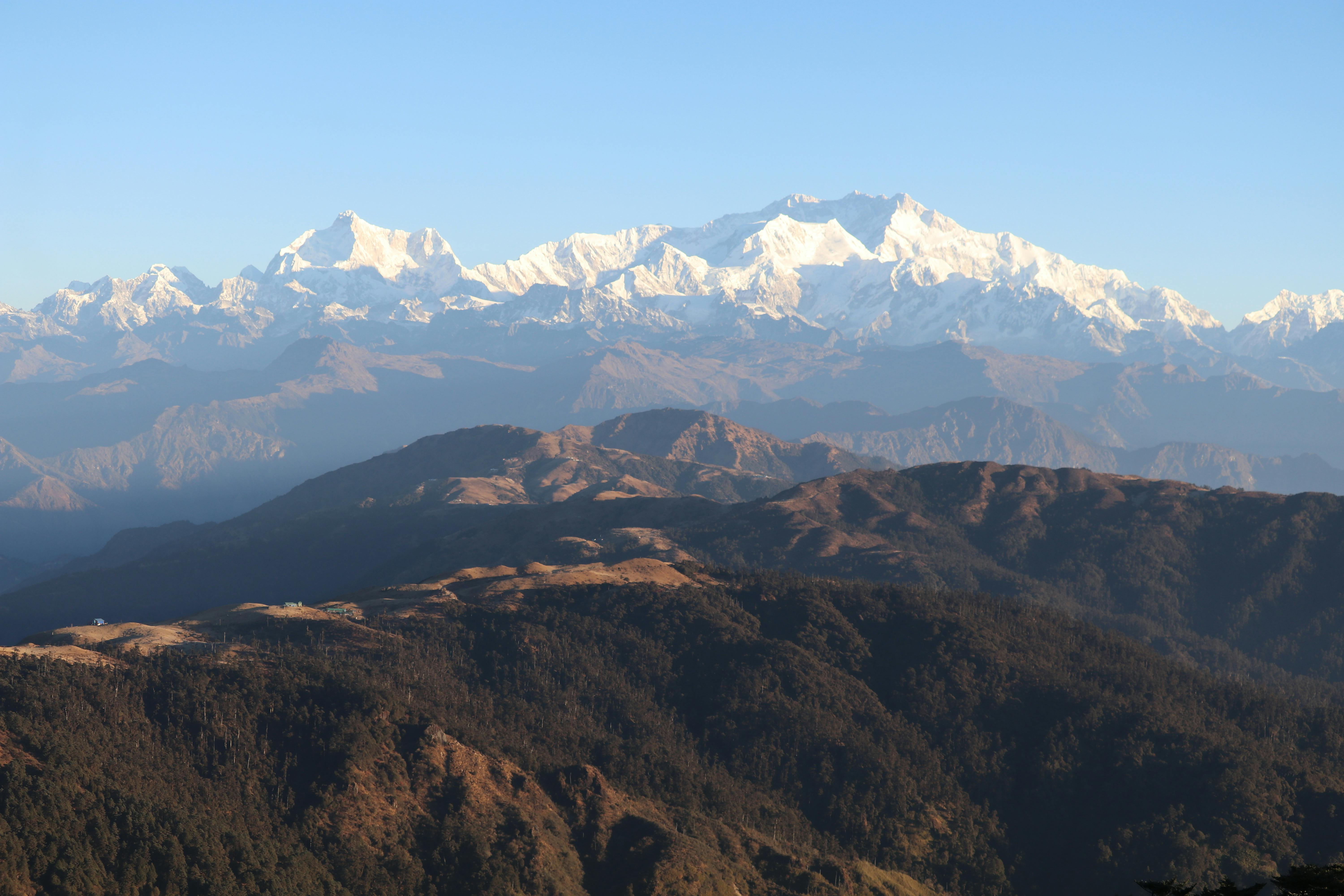 A pristine panoramic viewpoint looking toward the massive glaciers and ridges of Kanchenjunga.
