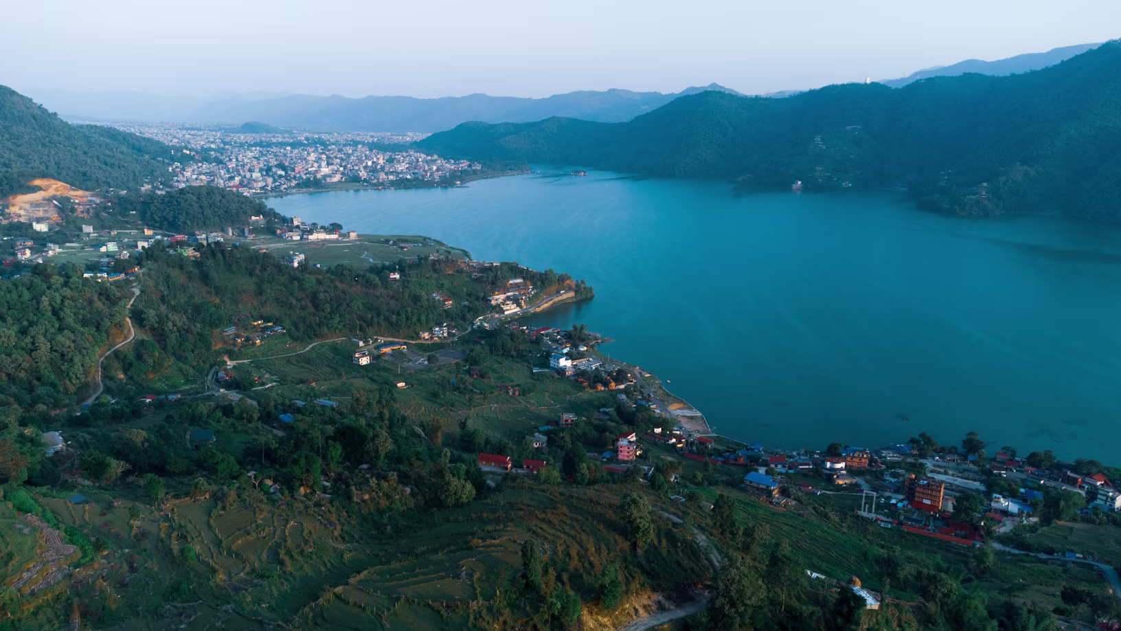 Dark storm clouds rolling over the valley hills showcasing typical Pokhara monsoon weather.