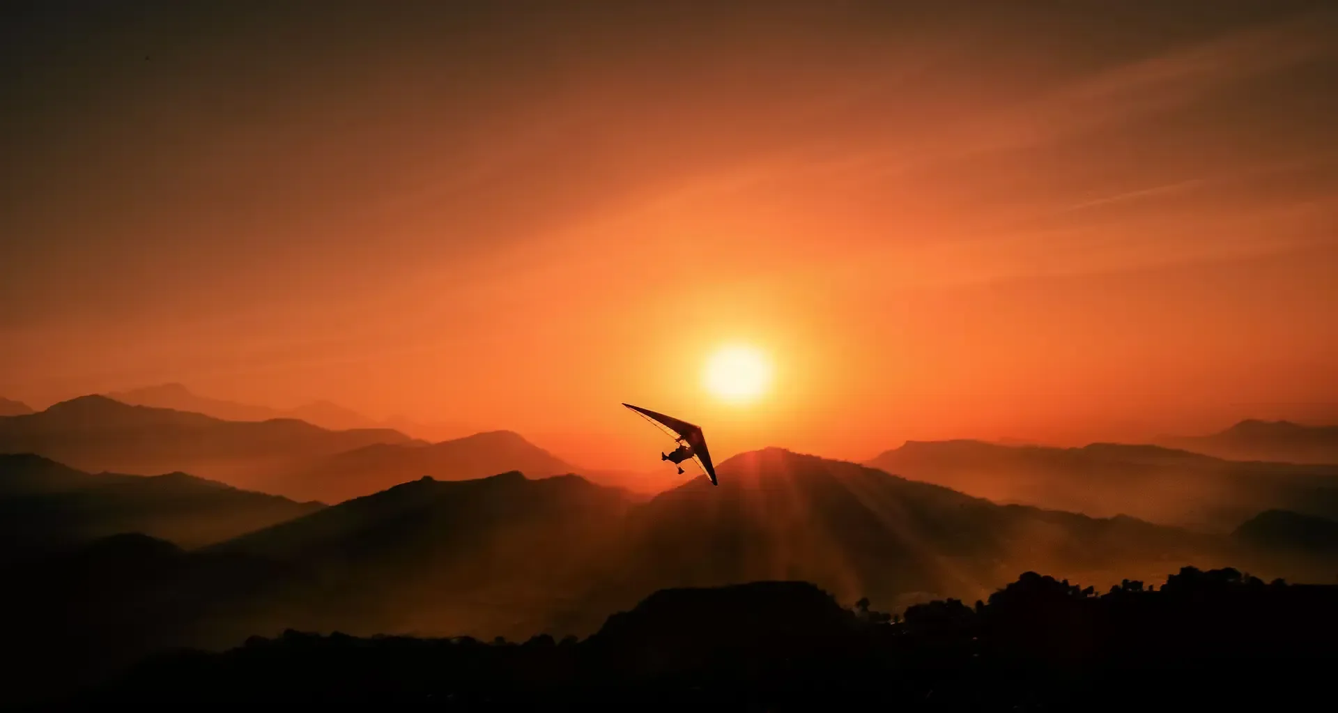 Ultralight flight during sunrise over Sarangkot viewpoint in Pokhara