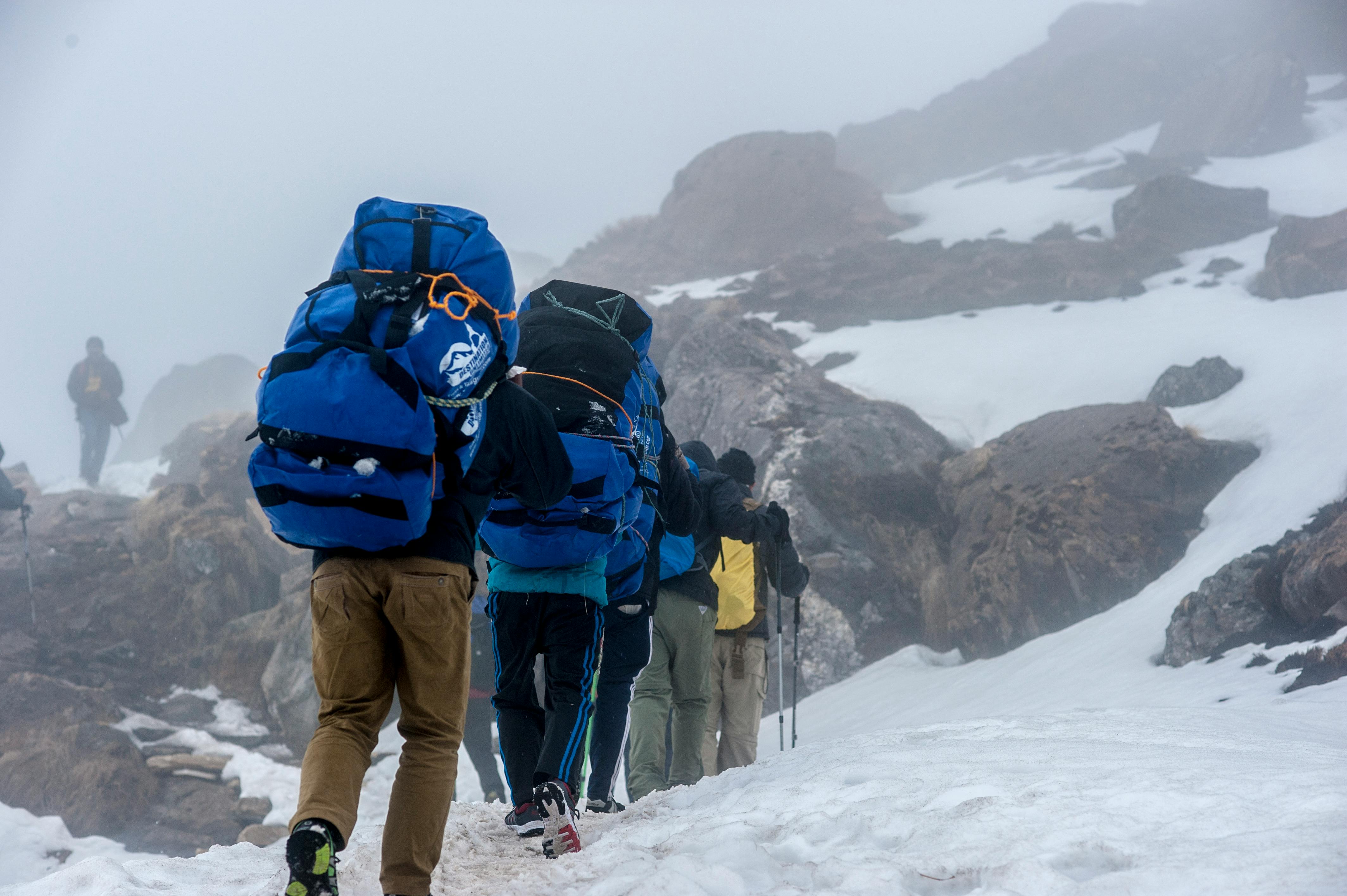 trekkers_carrying_equipment